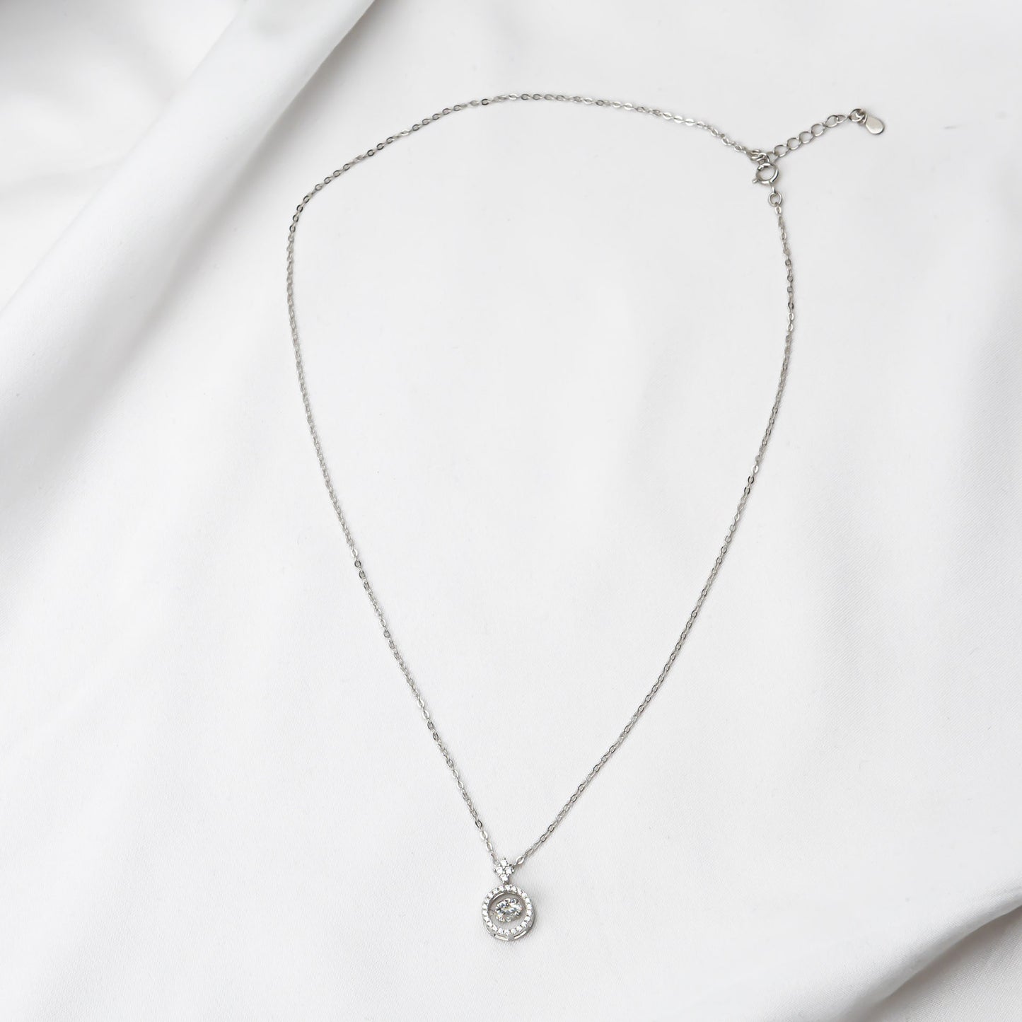 Mossanite pendant on a silver chain