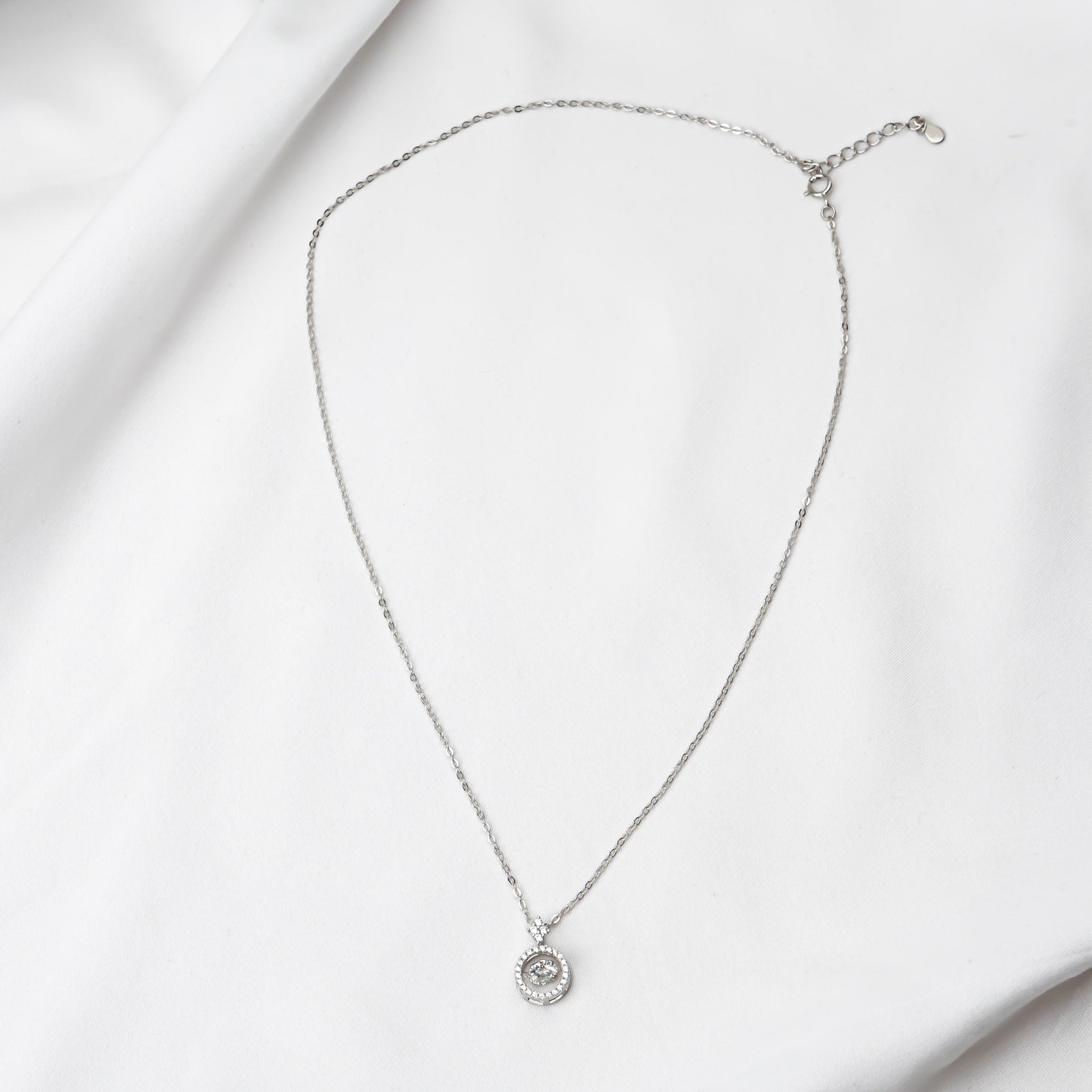 Mossanite pendant on a silver chain